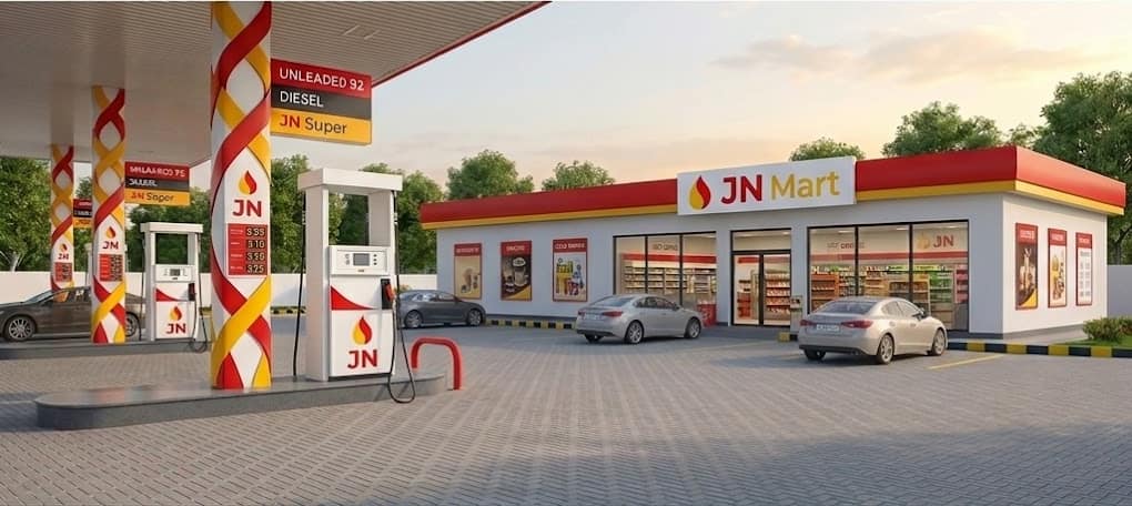 JN Mart station entrance and fuel pumps close-up