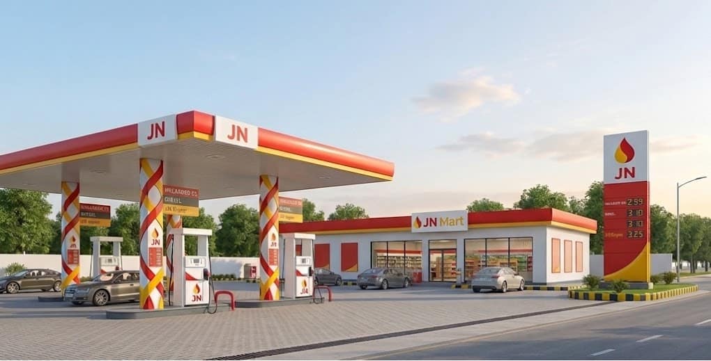 JN Mart retail station wide view with canopy and pumps
